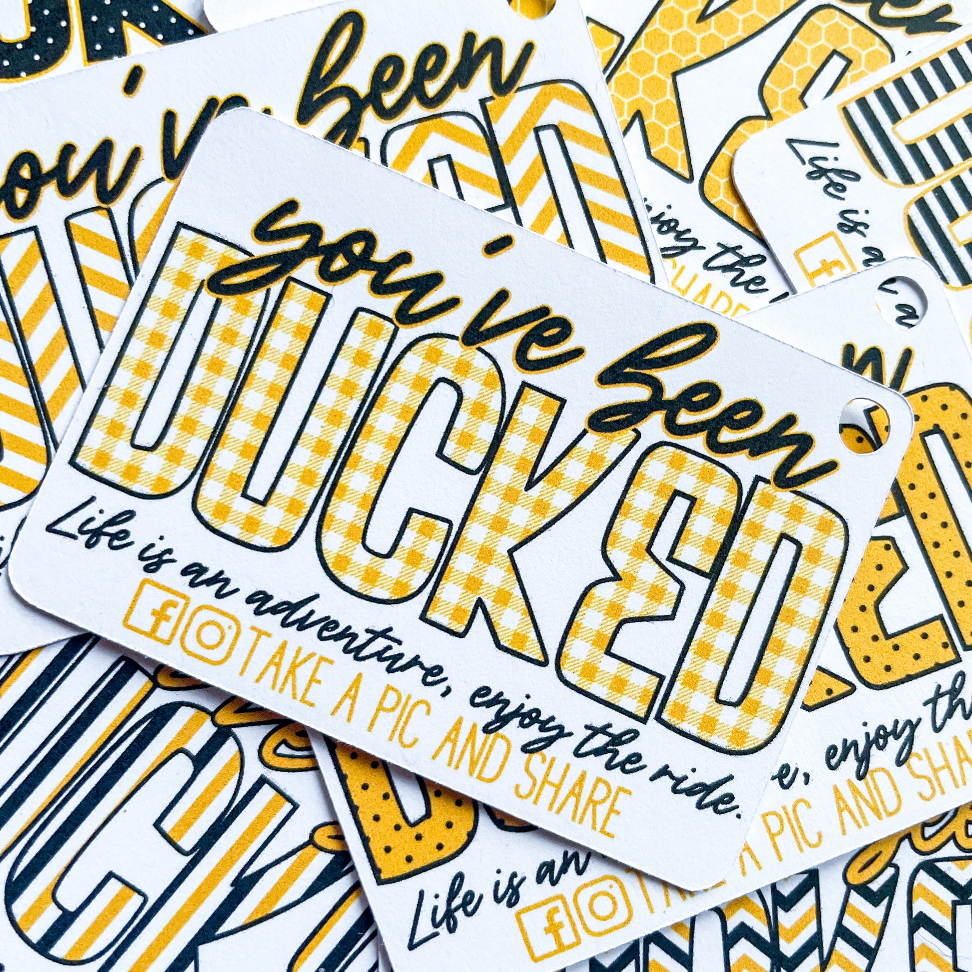 A bunch of Bumblebee Duck Tags with the words you're been duck 3d.
